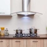 How to install a range hood in the kitchen with built-in cabinets, chimneys, and curved glass effectively zl70d2z4ol09o.jpg